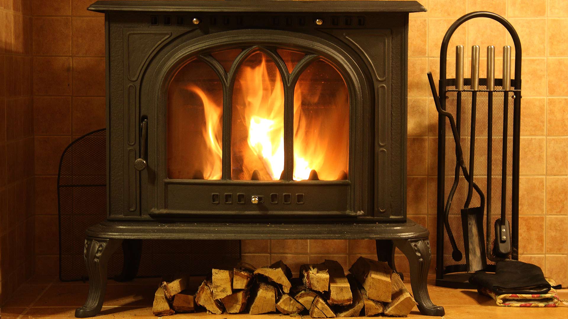34064906_l burning firewood logs in Worthing